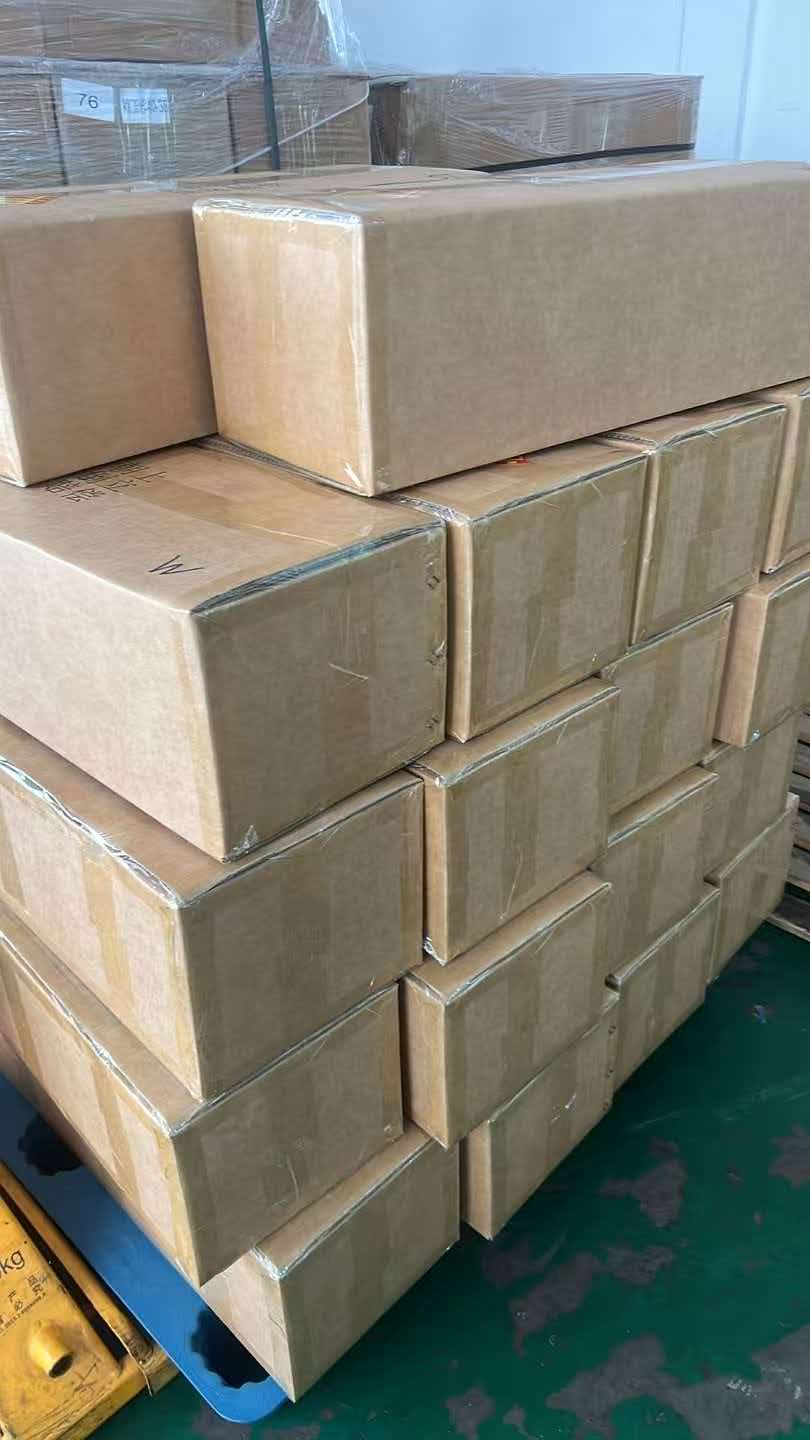 Stack of plain unmarked brown cartons ready to ship from the warehouse