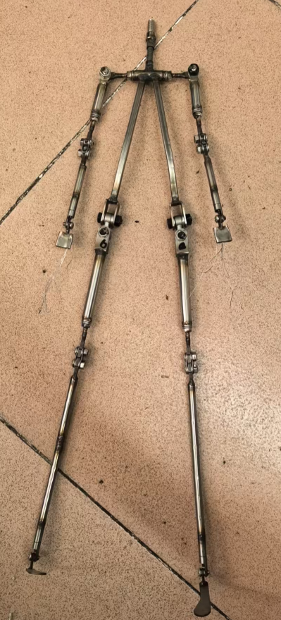 Custom alloy skeleton for a LORIBEAR mini doll laid out before casting