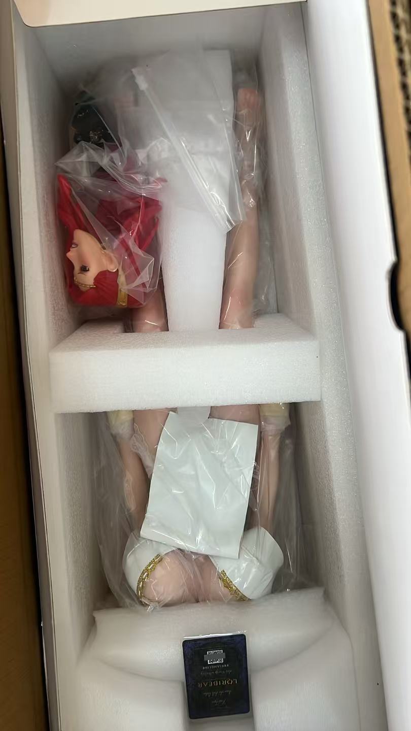 LORIBEAR box opened to show the foam insert, bagged figure and black anti-counterfeit card